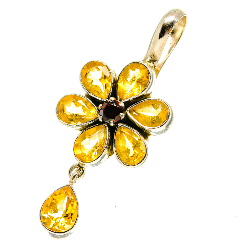 Sterling silver flower pendant with faceted yellow stones and dark center, dangling pear cut