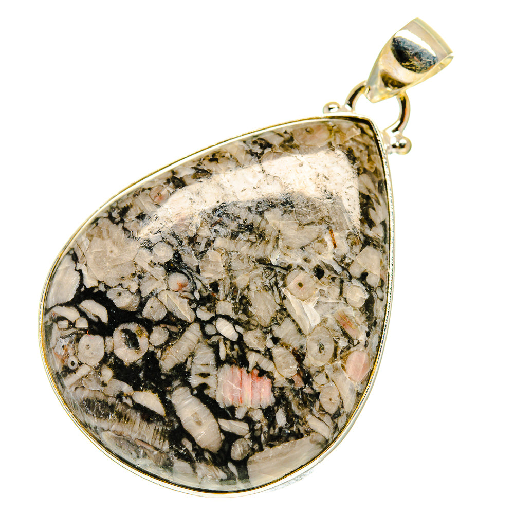 Sterling silver teardrop pendant with crinoid fossil stone cabochon and bale