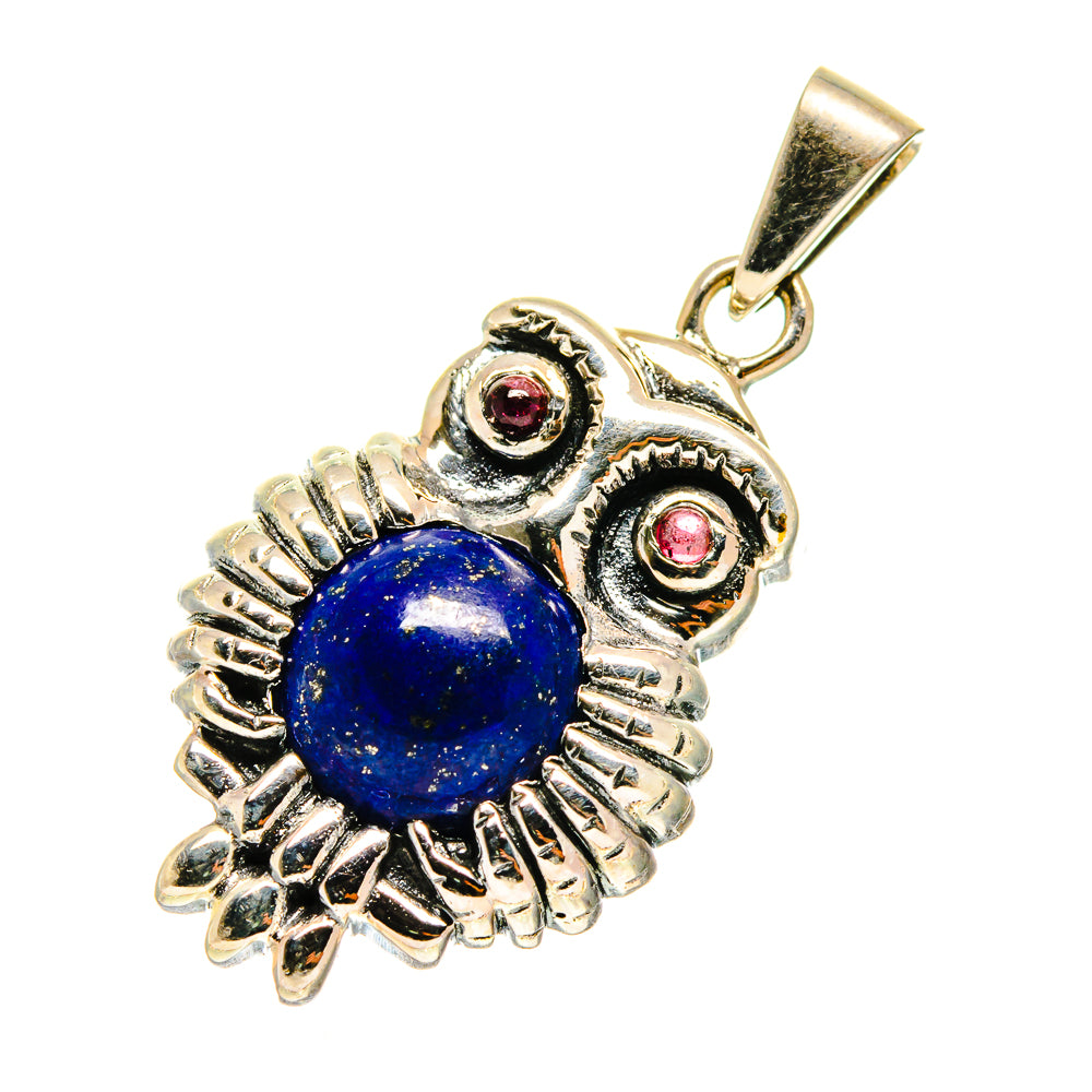 Sterling silver owl pendant with blue lapis cabochon, red garnet eyes, and top bail