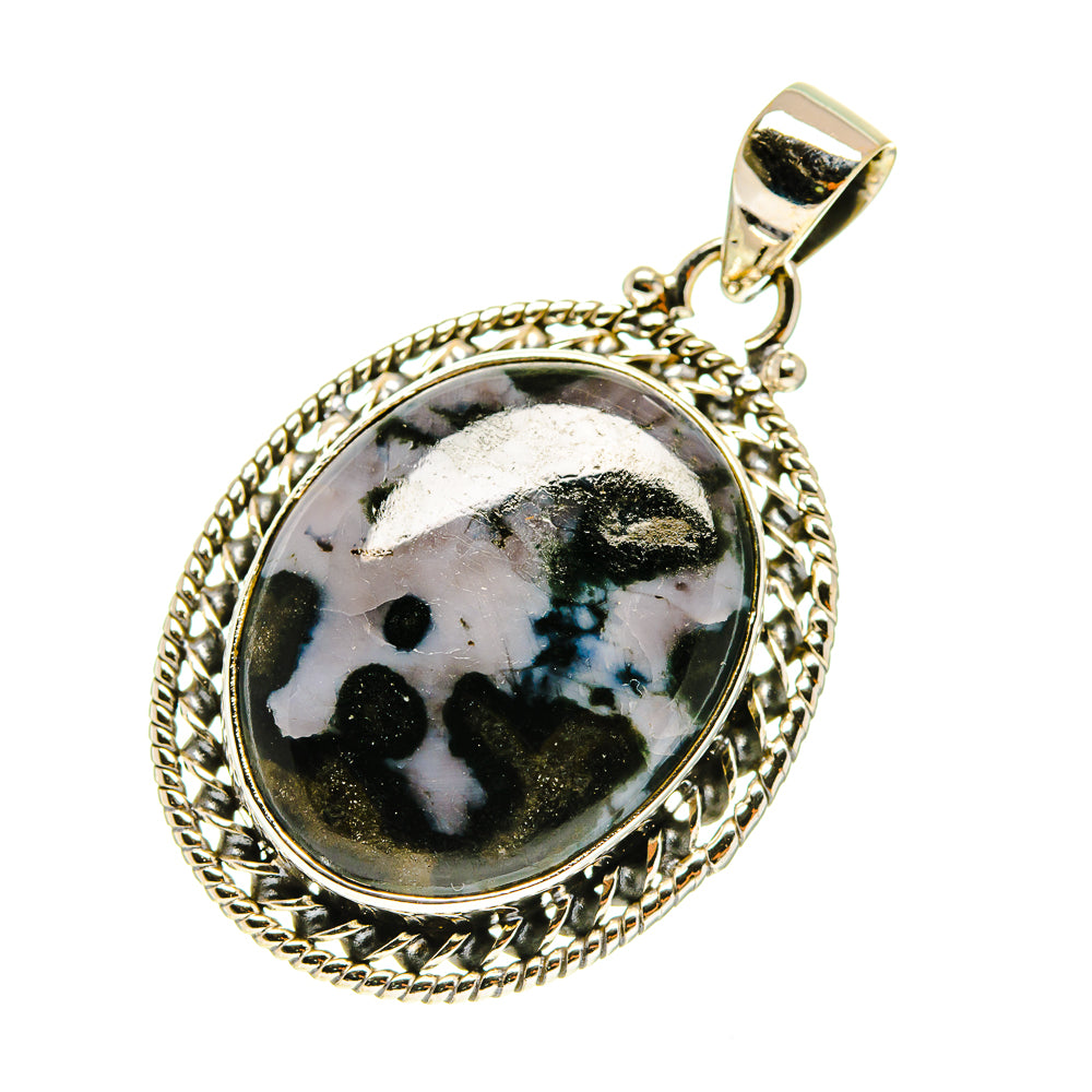 Oval sterling silver gabbro stone pendant with black-and-white speckled stone, bail on top