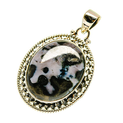 Oval sterling silver gabbro stone pendant with black-and-white speckled stone, bail on top