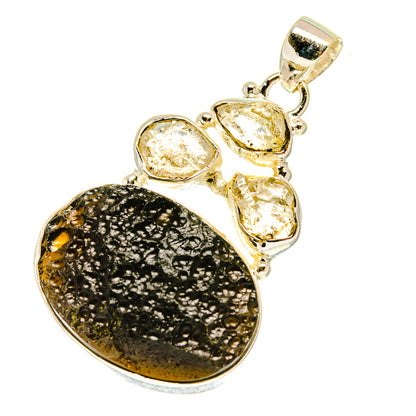 Tektite and Herkimer diamond pendant, oval black tektite with clear bezel-set stones in silver
