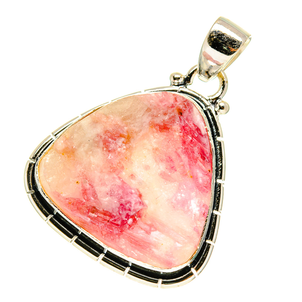 Heart-shaped pink tourmaline-in-quartz pendant with sterling silver bezel and bail.