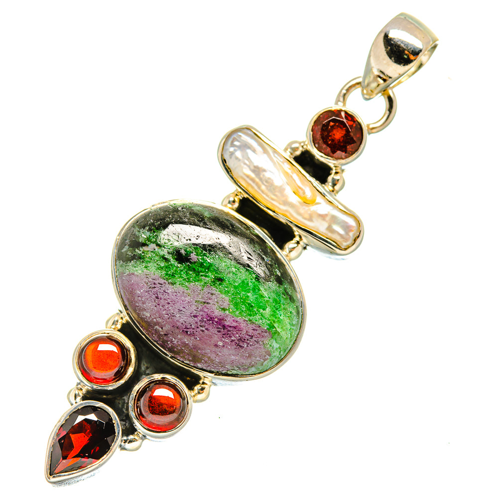 Oval gemstone pendant with green and purple stone, red bezel accents, silver bail