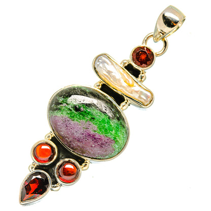 Oval gemstone pendant with green and purple stone, red bezel accents, silver bail