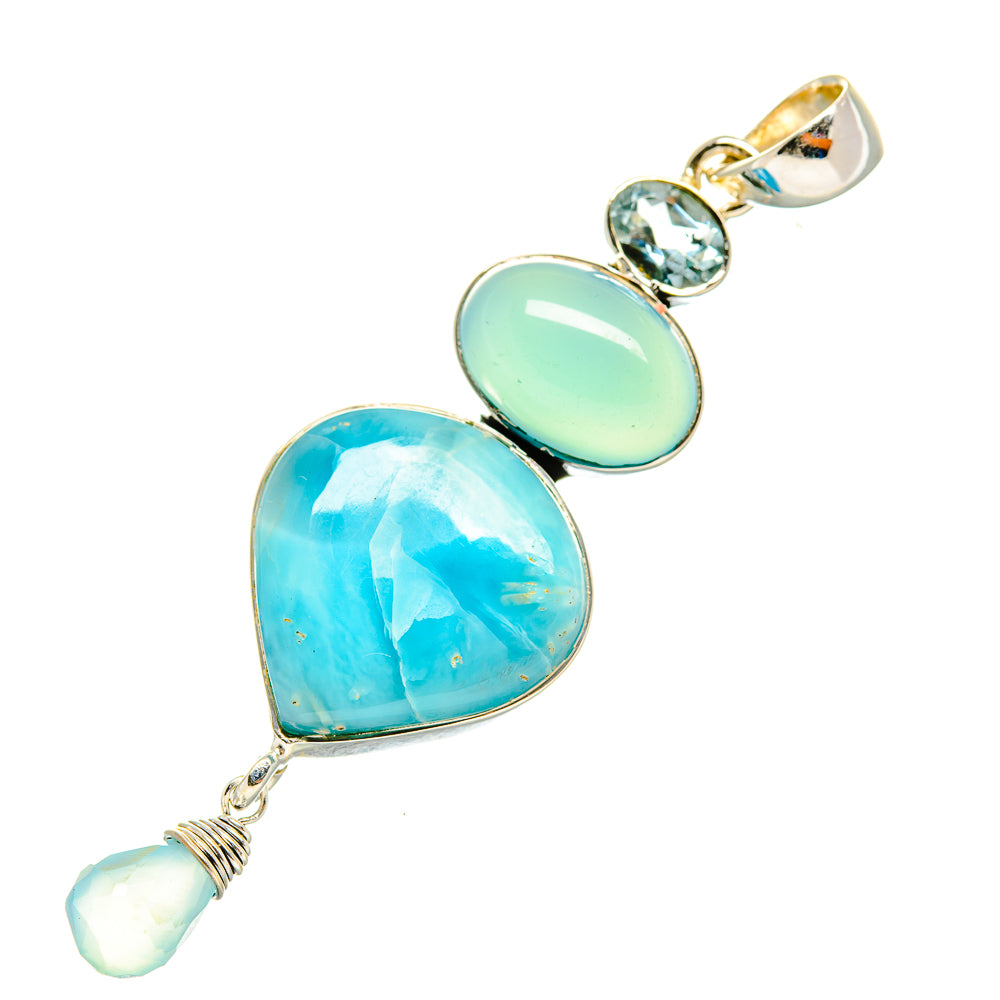 Sterling silver heart pendant with aqua and blue stones, blue gem accents, and white bead