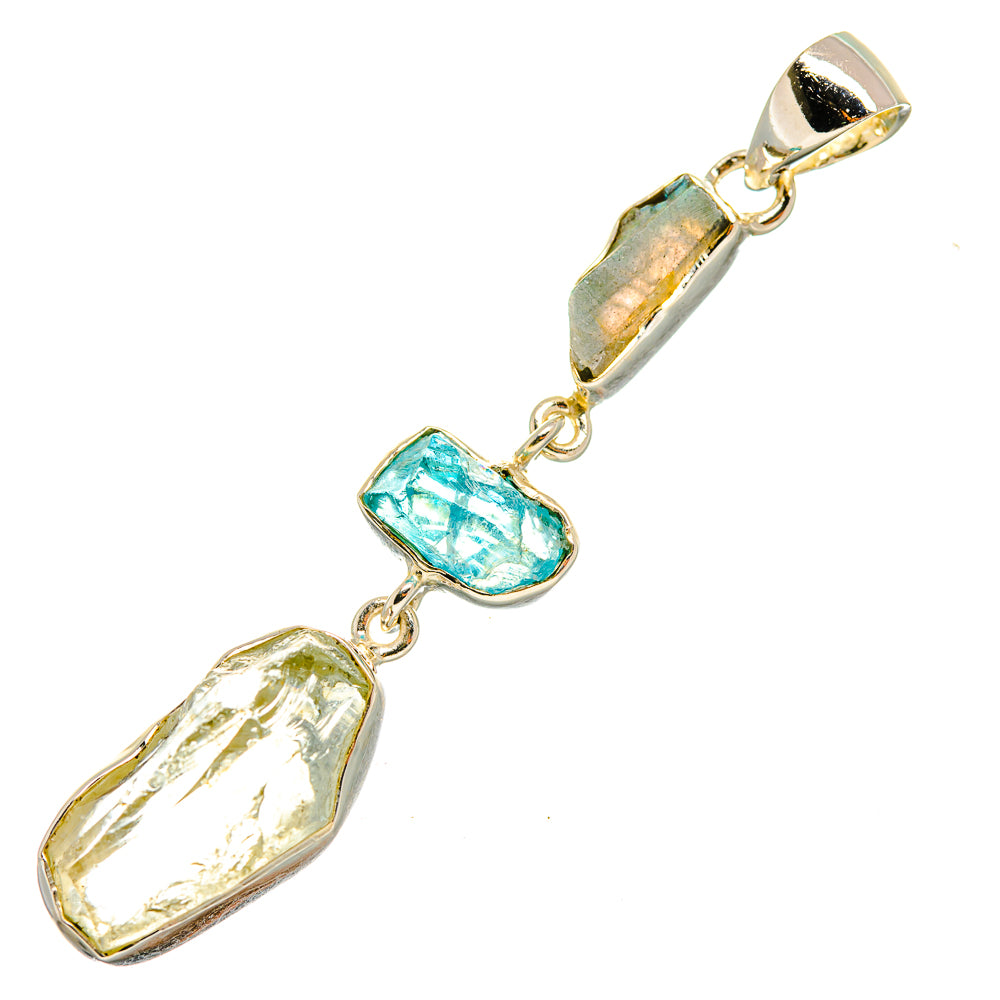Sterling silver pendant with rough turquoise, green, and light yellow gemstone pieces