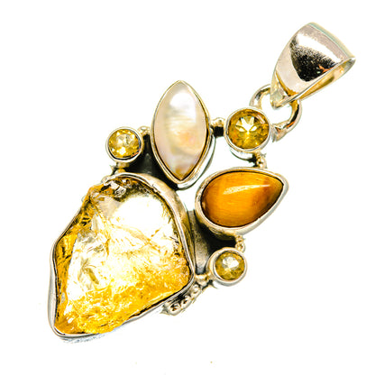 Sterling silver gemstone pendant with rough yellow crystal, amber oval stone, and mother-of-pearl