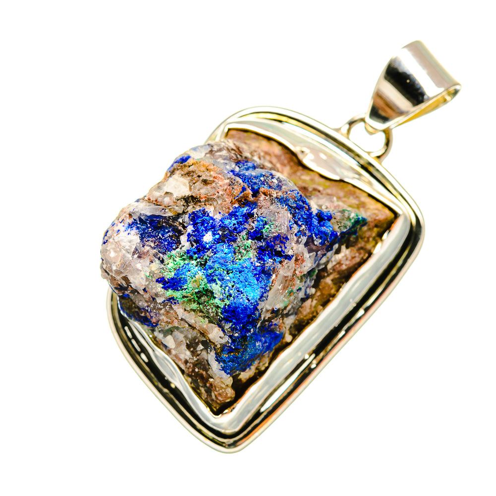 Sterling silver azurite pendant with rough blue mineral in teardrop bezel