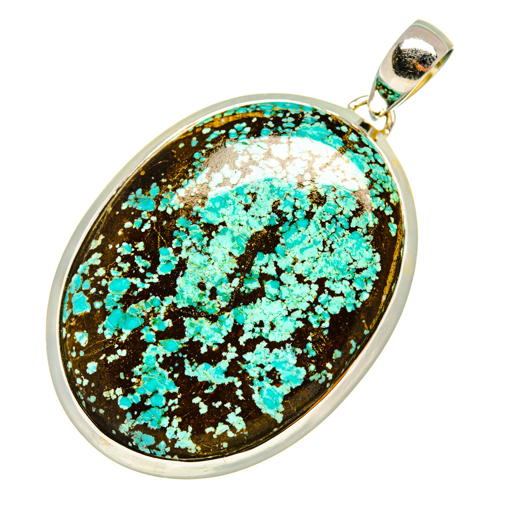 Oval turquoise pendant with speckled stone, sterling silver setting and bail