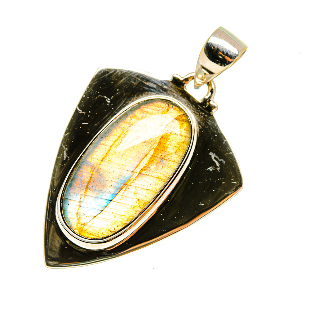 Labradorite pendant with oval golden flash stone, silver bezel and bail on dark backing
