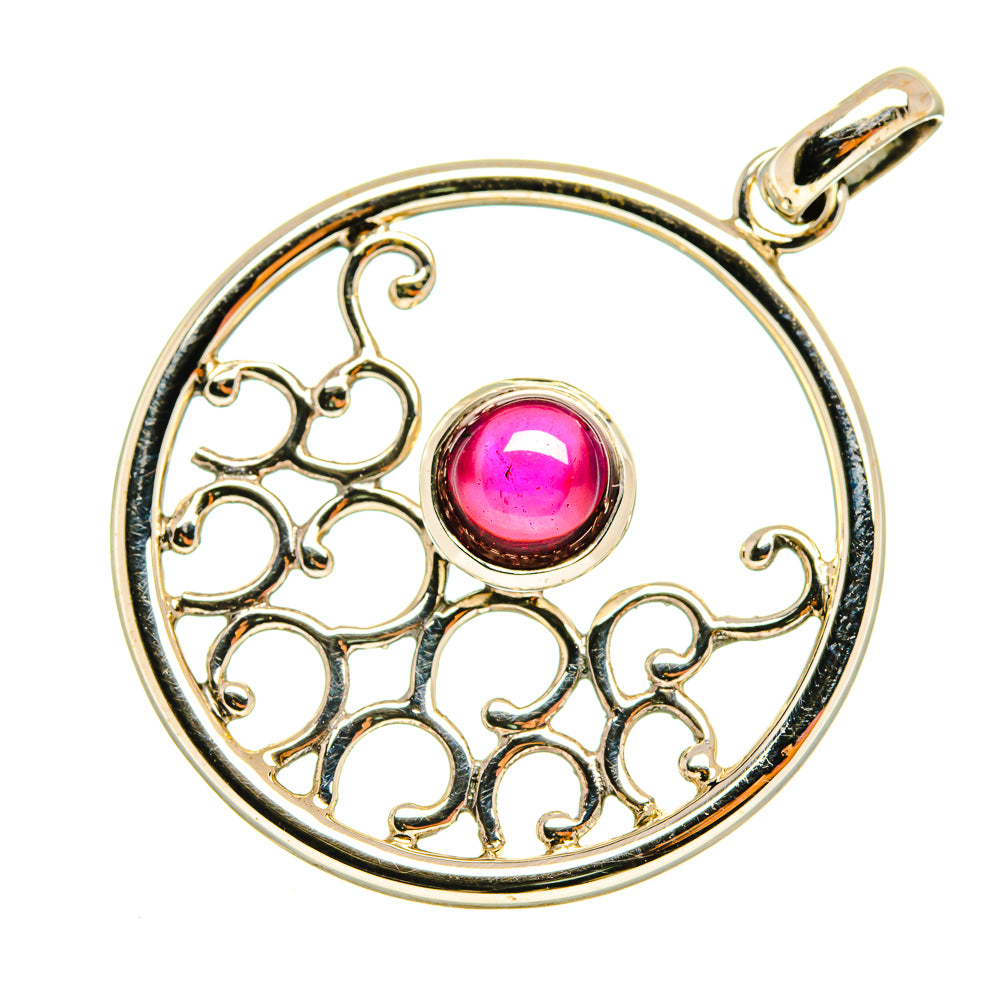 Sterling silver round garnet pendant with filigree design and pink gemstone