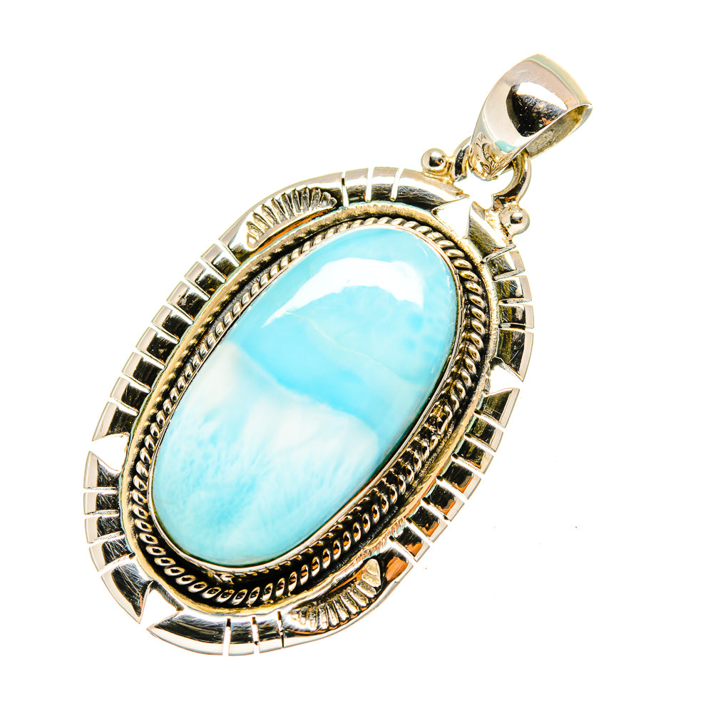 Oval larimar pendant with sky-blue stone in detailed sterling silver setting and bail