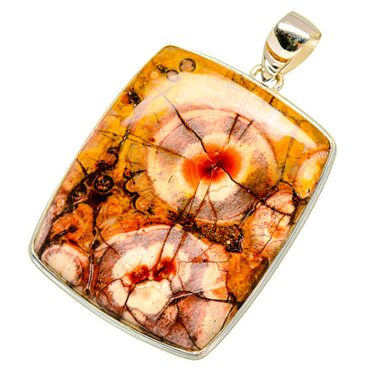 Square silver-framed jasper pendant with round bail; orange, brown, and cream cabochon