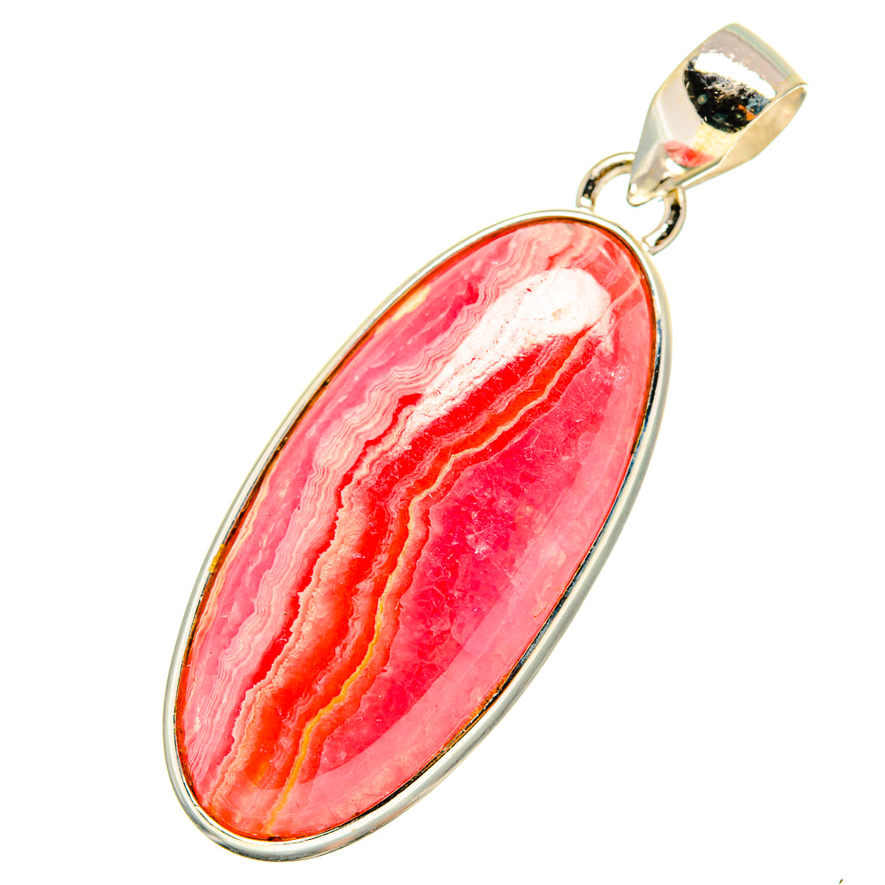 Rhodochrosite pendant in oval bezel, pink stone with ridged bands and silver bail