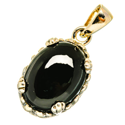 Black onyx oval pendant with bezel and loop bail, sterling silver tone details