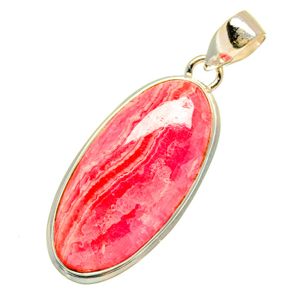 Rhodochrosite pendant in oval red-pink stone with sterling silver bezel and bail