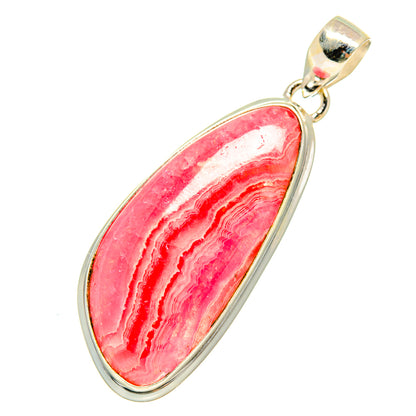 Rhodochrosite gemstone pendant in oval bezel with loop bail, pink-red stone