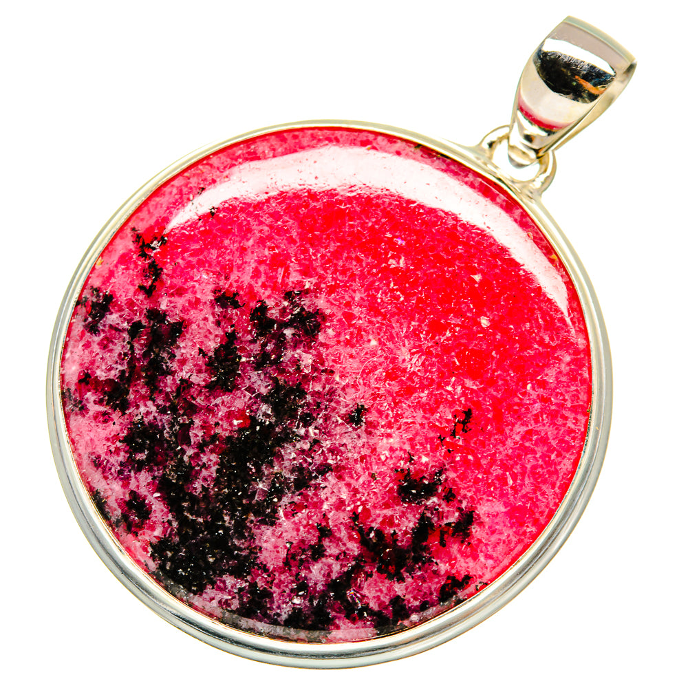 Round rhodonite pendant in polished 925 sterling silver bezel with red stone and black speckling