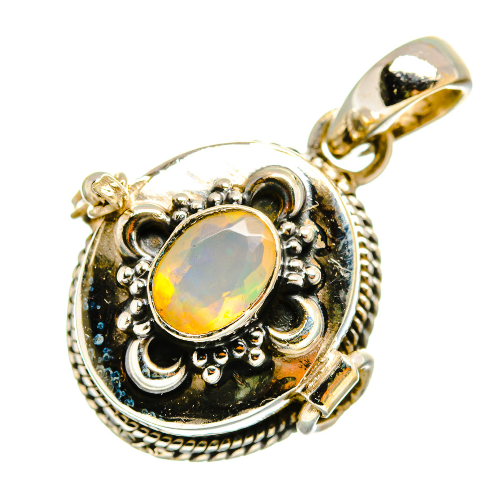 Sterling silver pendant with oval Ethiopian opal cabochon and ornate bezel detail