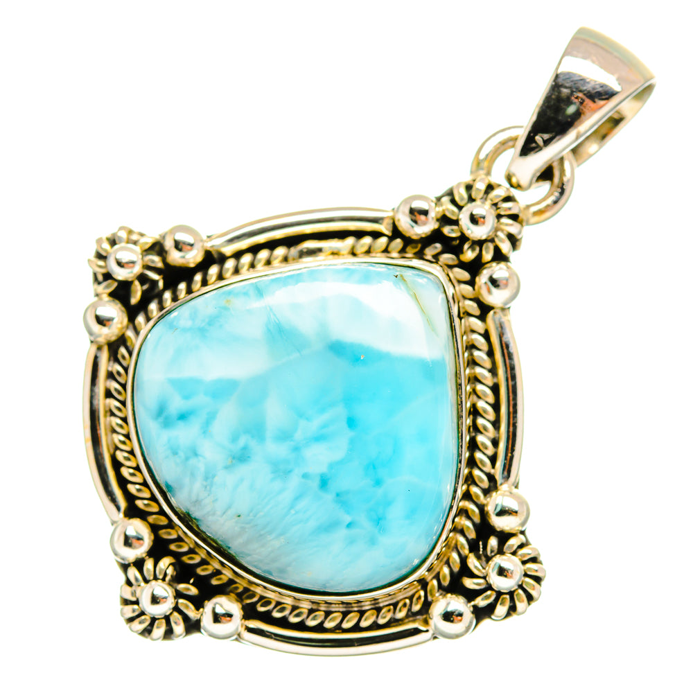 Larimar pendant with light blue teardrop stone in ornate rope and bead silver setting