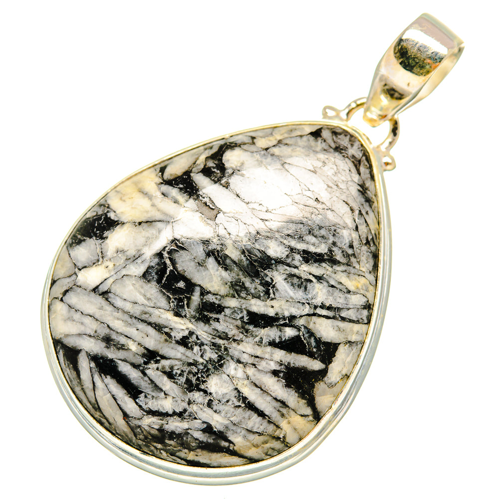 Teardrop stone pendant with black-and-white chrysanthemum stone, gold-tone bail, silver bezel