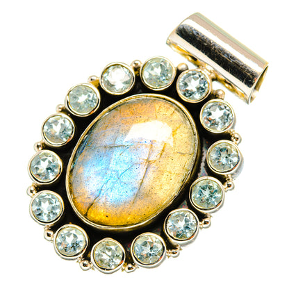 Labradorite pendant with oval labradorite center and round blue topaz halo, gold bail