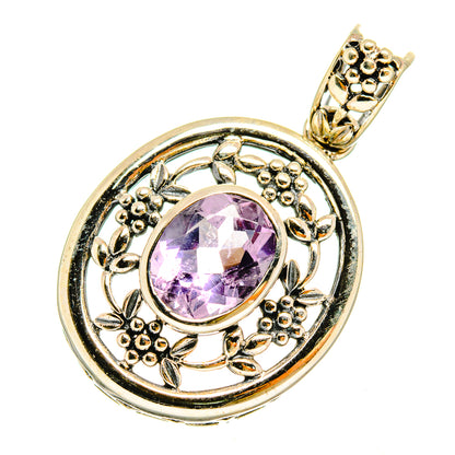 Sterling silver amethyst pendant with faceted oval purple gemstone and floral filigree