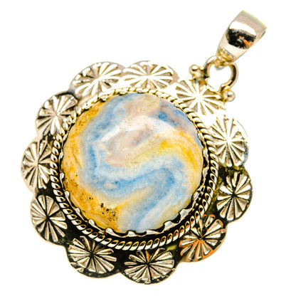 Blue oval scheelite pendant with filigree-pattern sterling silver bezel and bail loop