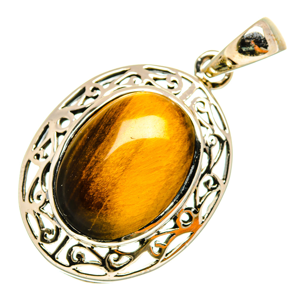 Tiger eye pendant with oval amber-gold stone and ornate sterling silver filigree bezel.