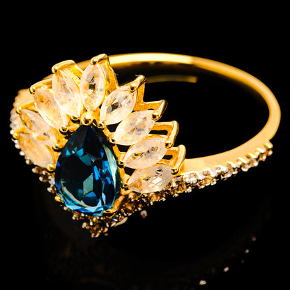 14K yellow gold ring with faceted tanzanite, ruby, and white sapphire accents