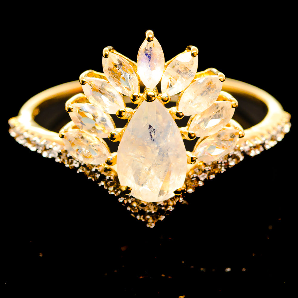 14K yellow gold ring with oval center gemstone and marquise side stones