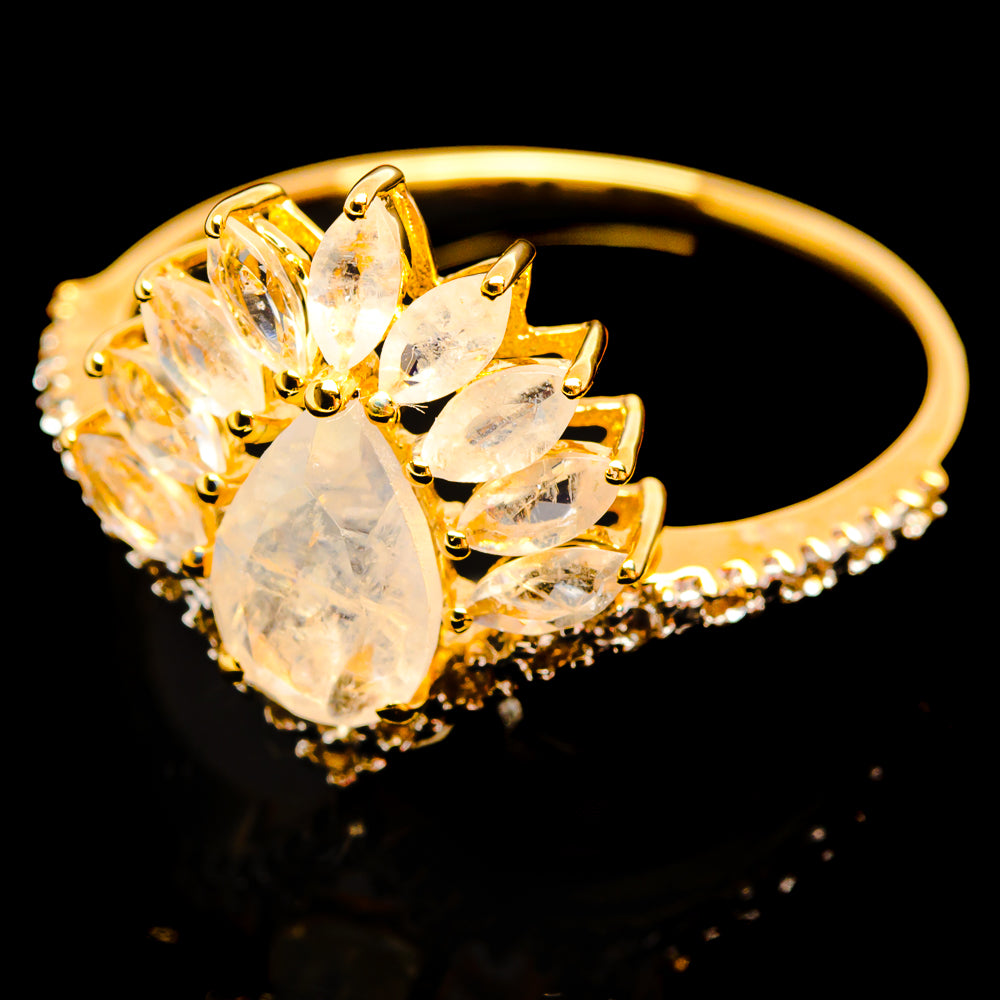 14K yellow gold ring with rainbow moonstone and white topaz cluster