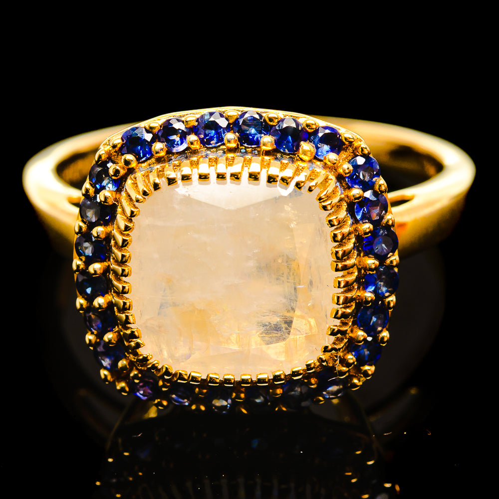 14K yellow gold ring with oval moonstone and blue sapphire halo, size 8