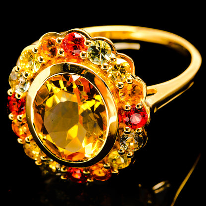 14K yellow gold ring with oval citrine center and multicolor gemstone side clusters