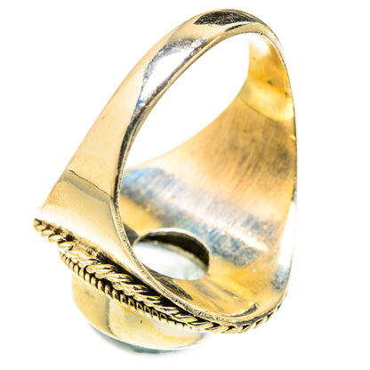 Oval aquamarine gemstone ring, sterling silver band with rope texture, open side view