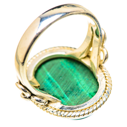 Sterling silver malachite ring with oval green stone, rope bezel and split shank
