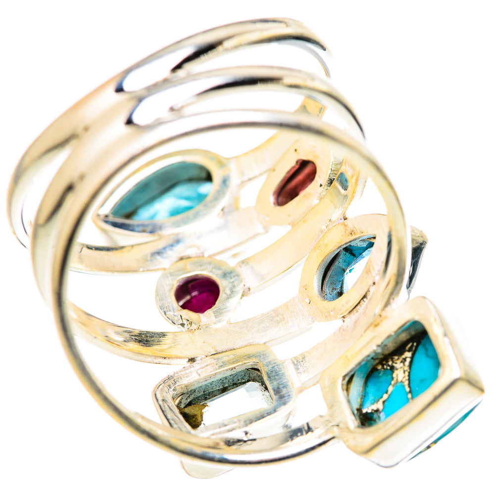Sterling silver ring with turquoise, garnet, blue topaz, and ornate blue stone settings