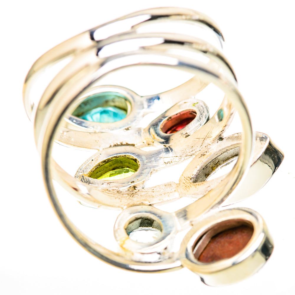 Sterling silver multi-stone ring with teal, green and brown oval settings at angle