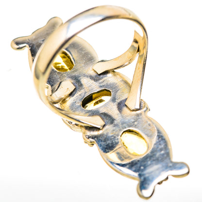 925 sterling silver ring with faceted yellow citrine bezel setting and openwork band