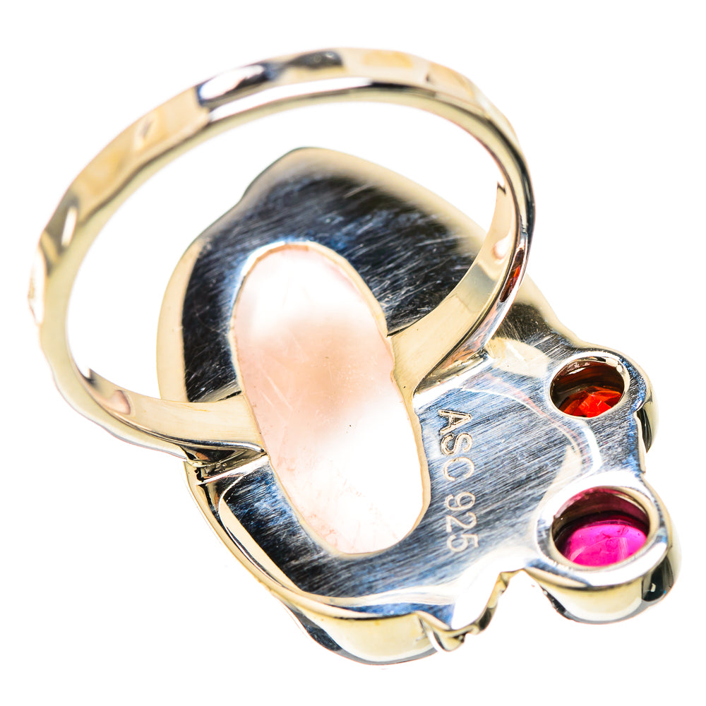 Sterling silver ring inside band engraved 925, with rose quartz oval and red/pink stones