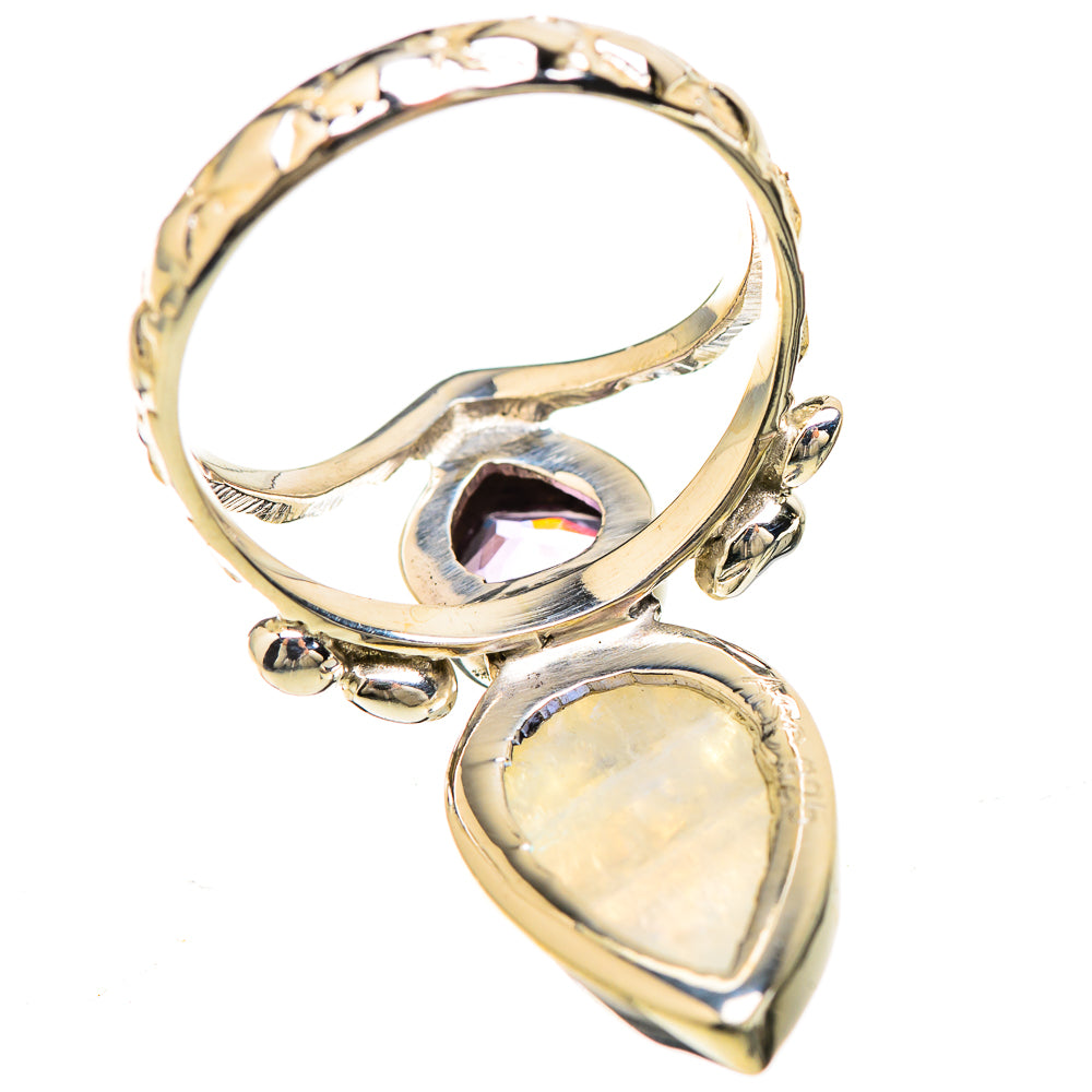 Sterling silver ring with teardrop moonstone and small purple gemstone accents