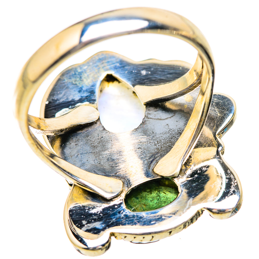 Silver-tone openwork heart-shaped ring with blue-lavender moonstone center and green gem
