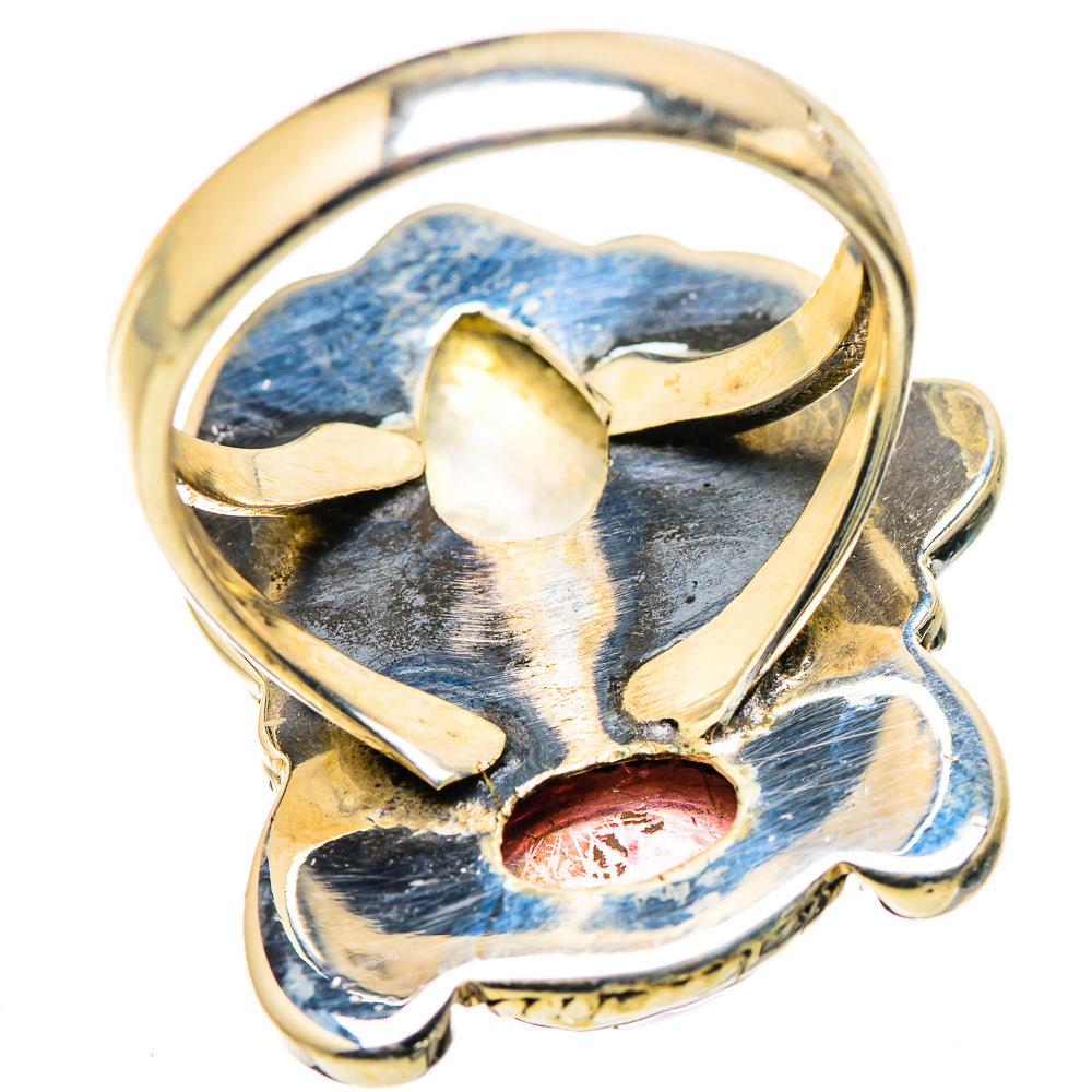 Silver-tone statement ring with oval moonstone center and pink tourmaline accent, side view
