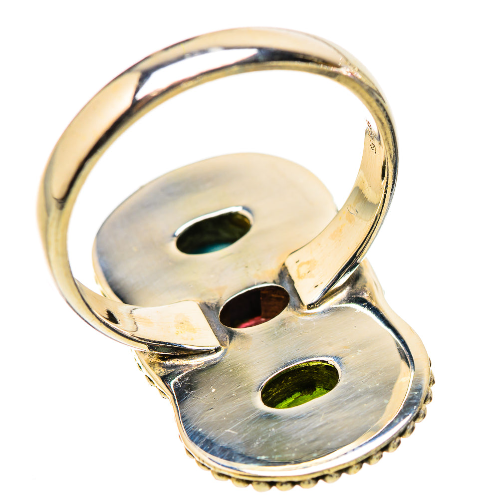 Sterling silver ring underside with oval gemstone settings and smooth band