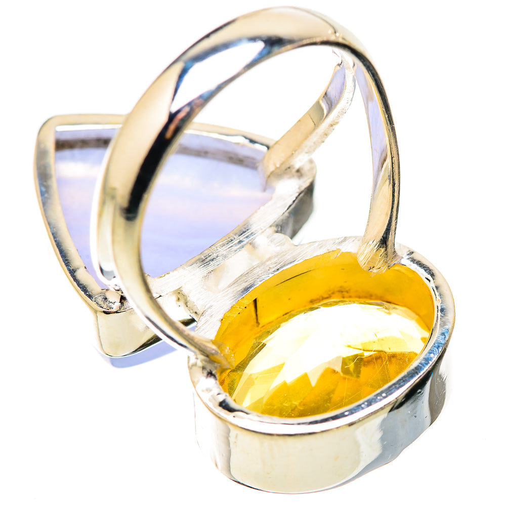 Sterling silver ring showing side view of blue-lavender and yellow citrine oval settings