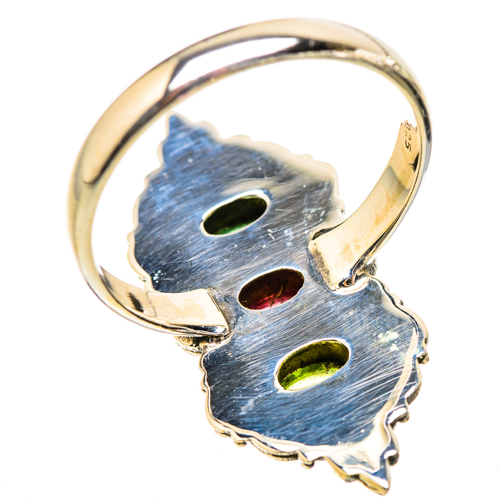 Ornate silver ring shank with openwork filigree and three set gemstones