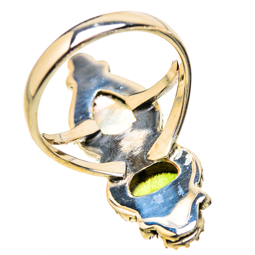 Sterling-silver ring with iridescent teardrop and oval green gemstone