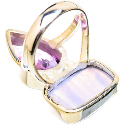 Sterling silver ring showing purple amethyst teardrop atop pale lavender cabochon