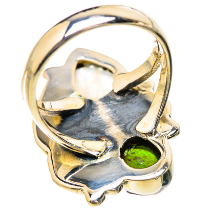 Polished sterling silver ring band with moonstone and green stone setting, openwork detail